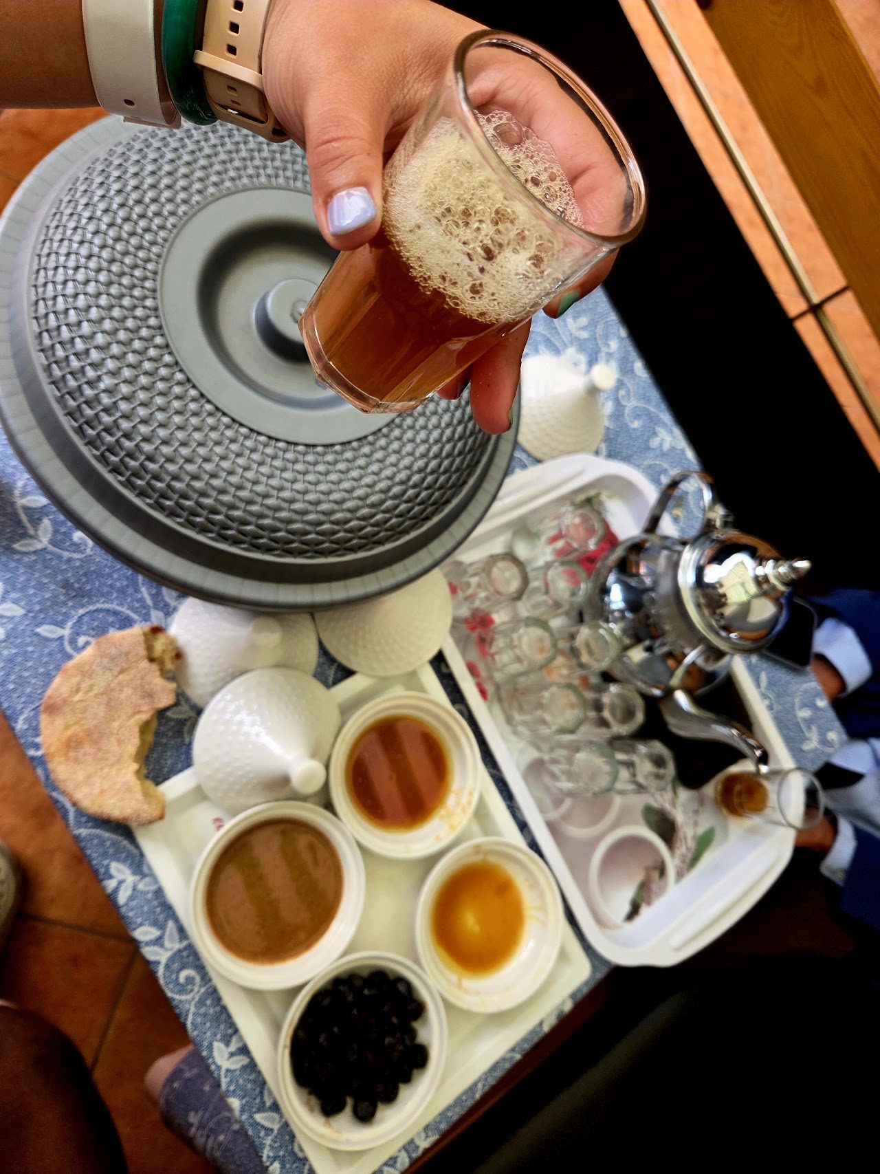 Moroccan mint tea tray with glasses and pastries served after the ride